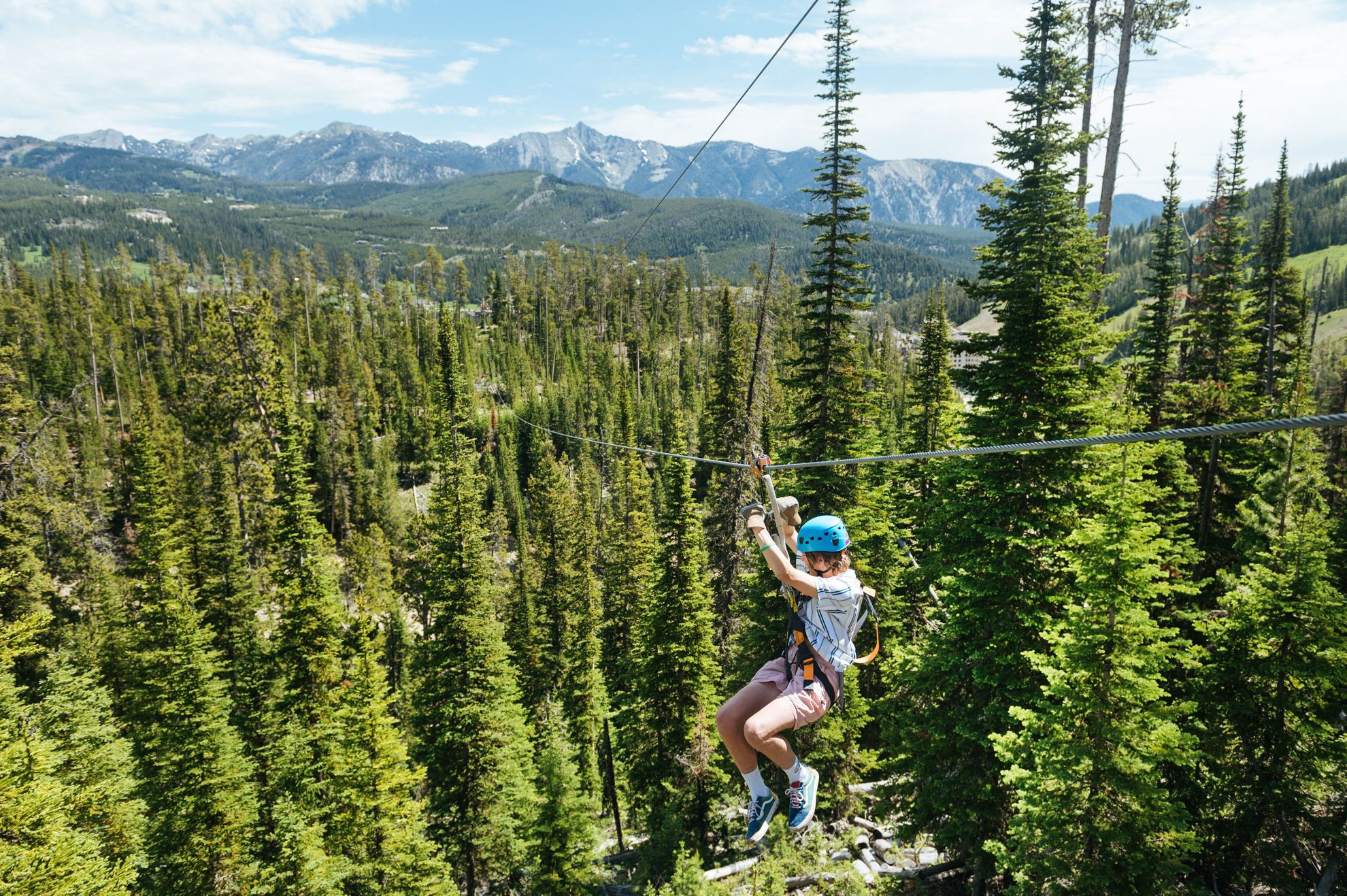 Ziplining with Mountains in the background